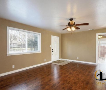 Cherry wood look laminate flooring with white trim selah construction and remodeling